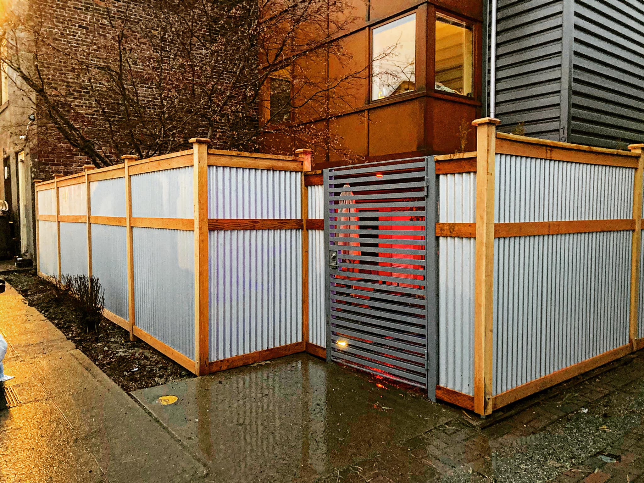 Wooden fence in Seattle rain