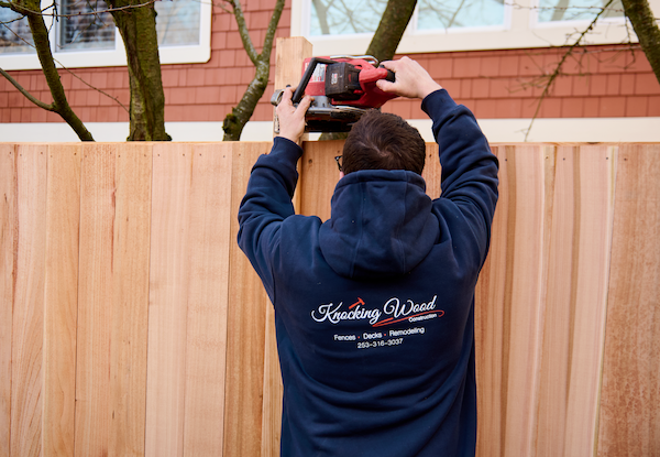 knocking-wood-fence-lock